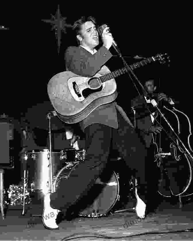 A Black And White Photograph Of Elvis Presley Performing On Stage In 1956. American Pop: Hit Makers Superstars And Dance Revolutionaries (American Music Milestones)