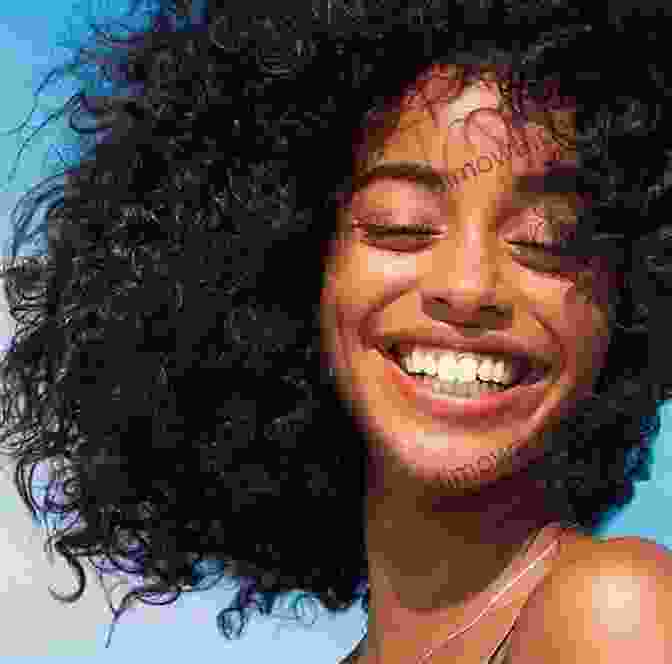 A Smiling Woman With Radiant Natural Hair The Locks Hated On With A Smile