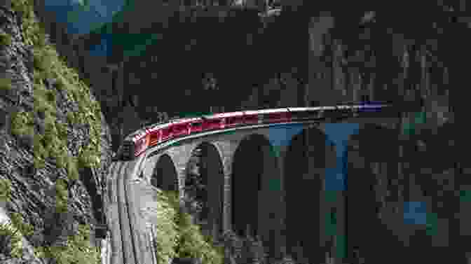 A Train Crossing A Scenic Viaduct With Mountains In The Background Ticket To Ride: Around The World On 49 Unusual Train Journeys