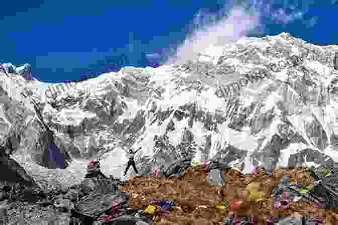 A Trekker Standing On A Mountaintop, Overlooking The Annapurna Himalayas In Winter Annapurna Pilgrim: A Solo Trek Of Nepal S Annapurna Circuit In Winter