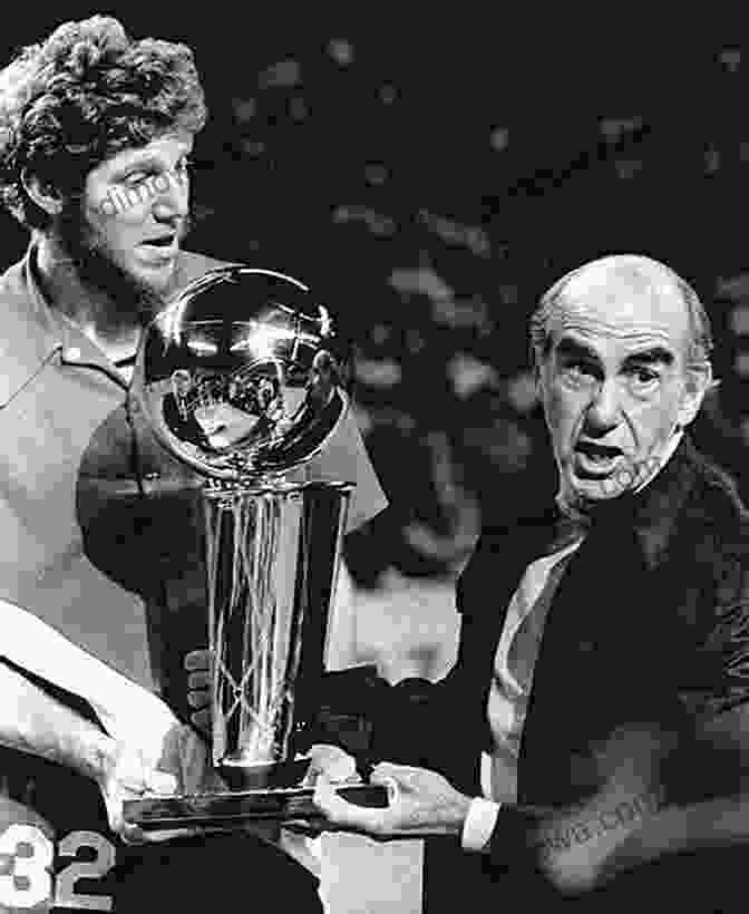 Bill Walton Holding His NBA Championship Rings Bill Walton: Information Career Personal Life And Awards About Bill Walton