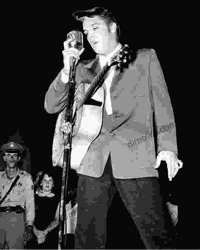 Elvis Presley Holding A Microphone, Representing The Romantic Ballad A Thousand Miles To Graceland