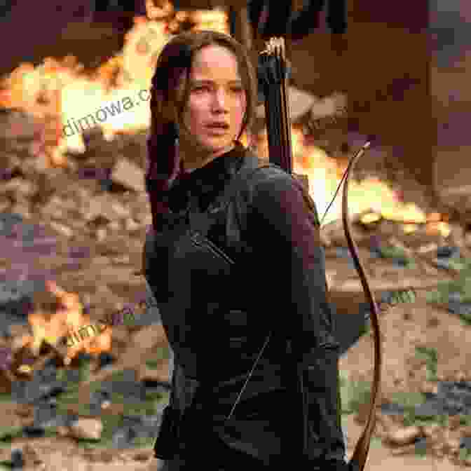 Katniss Everdeen, The Defiant Heroine Of The Hunger Games, Standing Defiantly With Bow And Arrow Chosen One: The Heroine S Journey Of Katniss Elsa Tris Bella And Rey